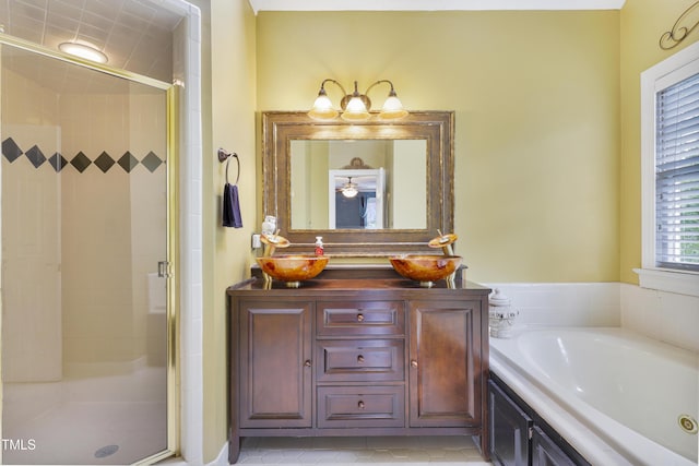 117 Vicksburg Dr, Cary, NC 27513 - bathroom featuring a bath, vanity, tile patterned flooring, and a shower stall