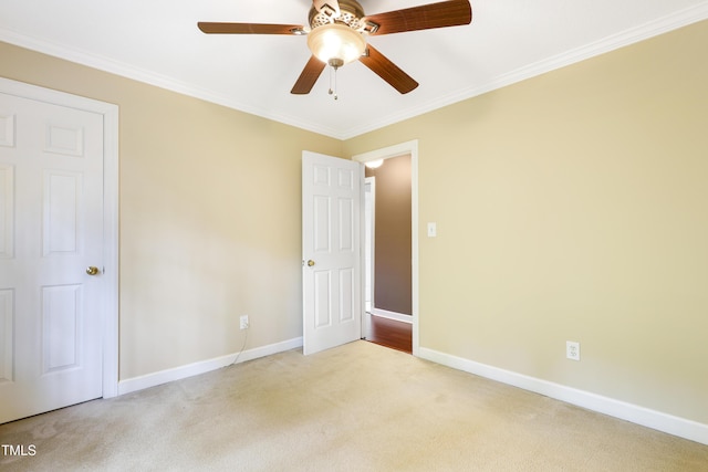 117 Vicksburg Dr, Cary, NC 27513 - unfurnished bedroom with a ceiling fan, baseboards, carpet, and crown molding