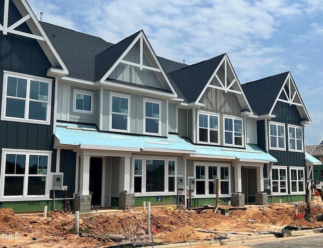 3020 White Rail Dr, Fuquay Varina, NC 27526 - view of front of house featuring board and batten siding and a shingled roof