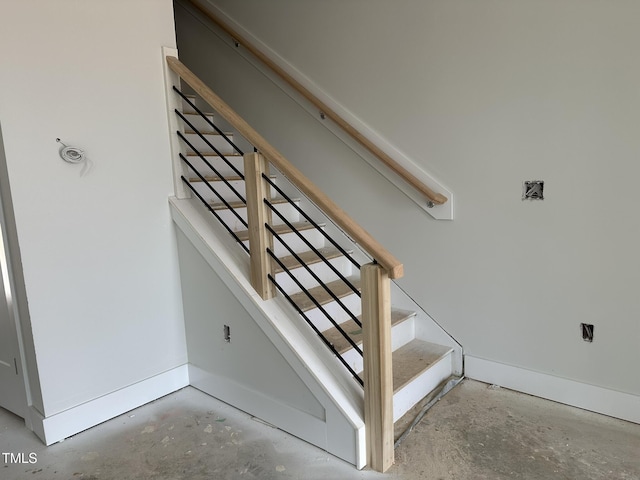 3020 White Rail Dr, Fuquay Varina, NC 27526 - staircase featuring concrete flooring and baseboards