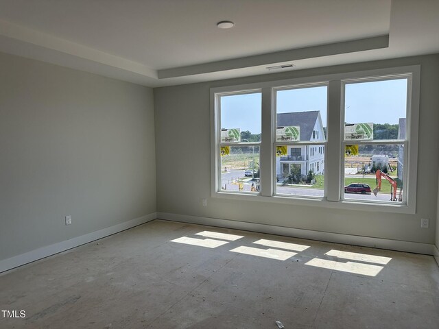 3020 White Rail Dr, Fuquay Varina, NC 27526 - unfurnished room with baseboards and a raised ceiling