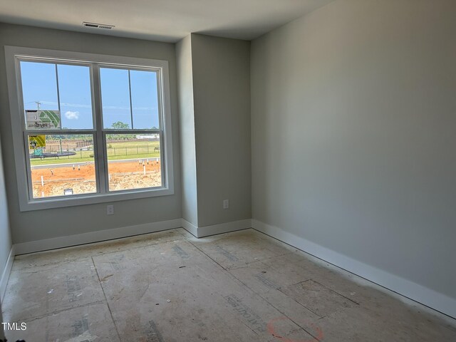 3020 White Rail Dr, Fuquay Varina, NC 27526 - spare room featuring baseboards