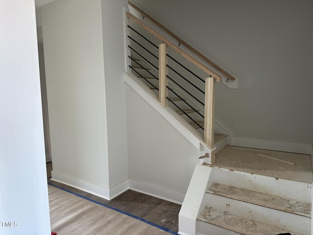 3020 White Rail Dr, Fuquay Varina, NC 27526 - staircase with wood finished floors and baseboards