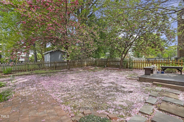fenced backyard with a wooden deck