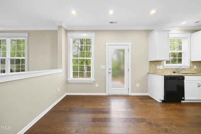 kitchen featuring dark wood-type flooring, visible vents, white cabinets, and dishwasher
