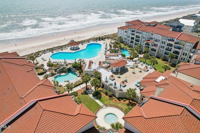 790 New River Inlet Rd Unit 113B, North Topsail Beach, NC 28460 - drone / aerial view featuring a beach view and a water view