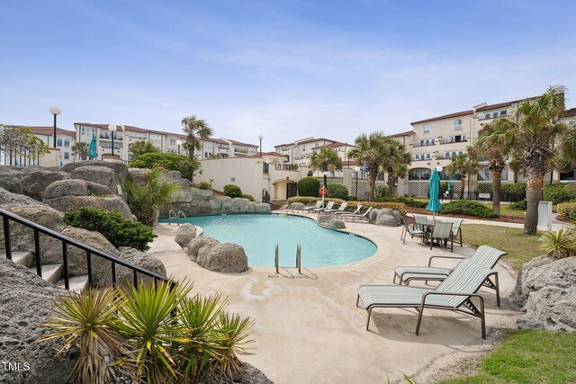 790 New River Inlet Rd Unit 113B, North Topsail Beach, NC 28460 - pool with a patio area and a residential view
