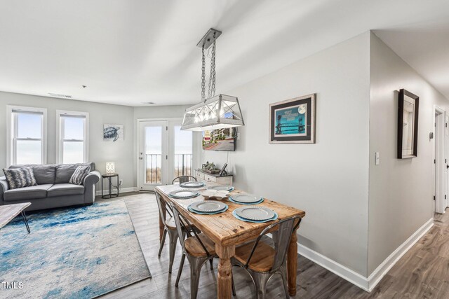790 New River Inlet Rd Unit 113B, North Topsail Beach, NC 28460 - dining area featuring wood finished floors and baseboards