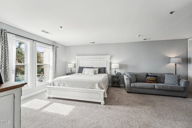 790 New River Inlet Rd Unit 113B, North Topsail Beach, NC 28460 - carpeted bedroom featuring visible vents and baseboards