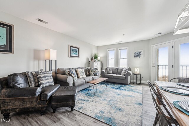 790 New River Inlet Rd Unit 113B, North Topsail Beach, NC 28460 - living room with wood finished floors and visible vents