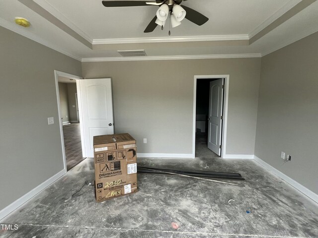 101 Waterstone Ct, Fremont, NC 27830 - unfurnished bedroom featuring ornamental molding, a tray ceiling, and ceiling fan