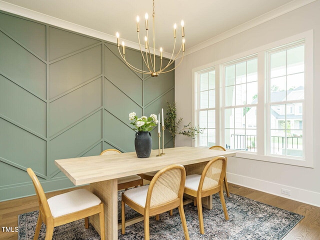 921 Lily Claire Ln, Fuquay Varina, NC 27526 - dining area featuring a chandelier, crown molding, and wood finished floors