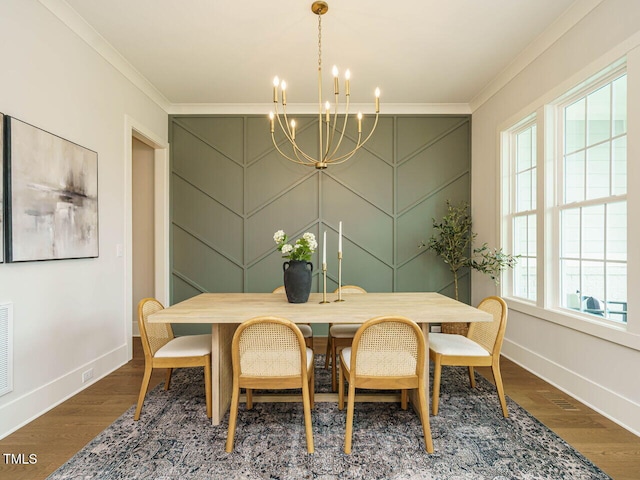 921 Lily Claire Ln, Fuquay Varina, NC 27526 - dining area featuring crown molding, a chandelier, and dark wood-style floors