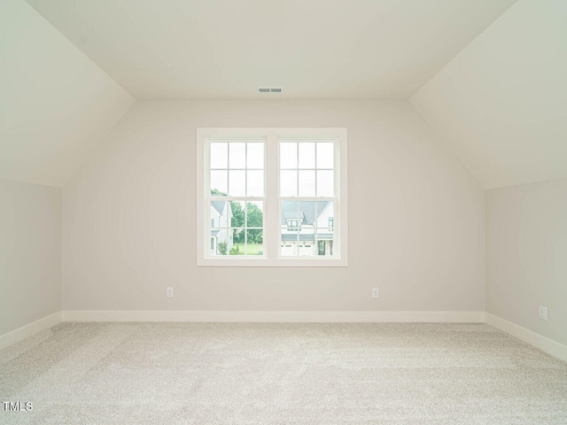 921 Lily Claire Ln, Fuquay Varina, NC 27526 - bonus room with lofted ceiling and carpet floors