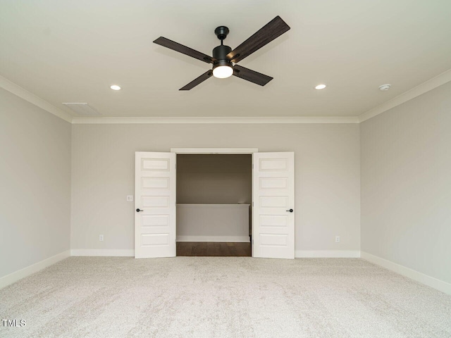 921 Lily Claire Ln, Fuquay Varina, NC 27526 - unfurnished bedroom with crown molding, carpet, recessed lighting, a closet, and a ceiling fan