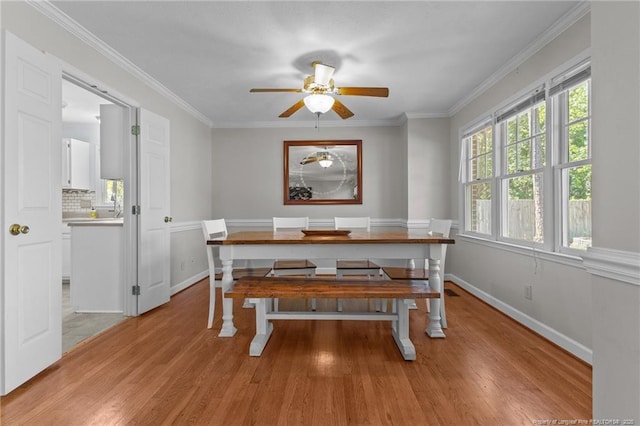 7783 Trappers Rd, Fayetteville, NC 28311 - dining room featuring light wood-style floors, baseboards, and ceiling fan