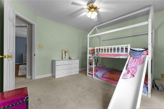 7783 Trappers Rd, Fayetteville, NC 28311 - carpeted bedroom with baseboards and a ceiling fan