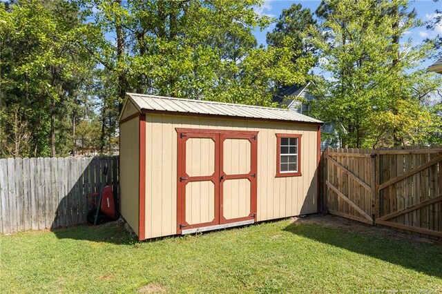 7783 Trappers Rd, Fayetteville, NC 28311 - view of shed featuring a fenced backyard