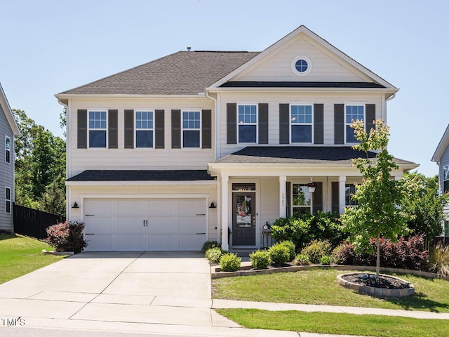 view of front of house featuring driveway, an attached garage, covered porch, and roof with shingles