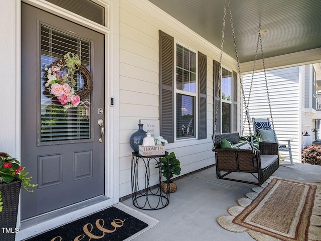 entrance to property with a porch
