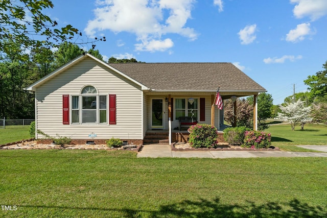 view of front facade featuring crawl space, roof with shingles, covered porch, and a front yard