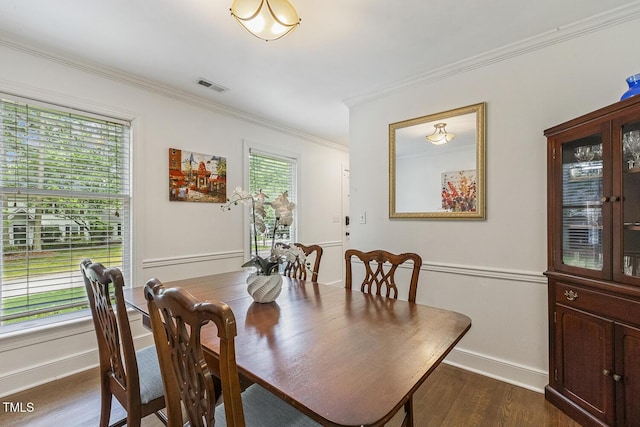 105 Cavendish Dr, Cary, NC 27513 - dining room featuring plenty of natural light, dark wood finished floors, crown molding, and baseboards