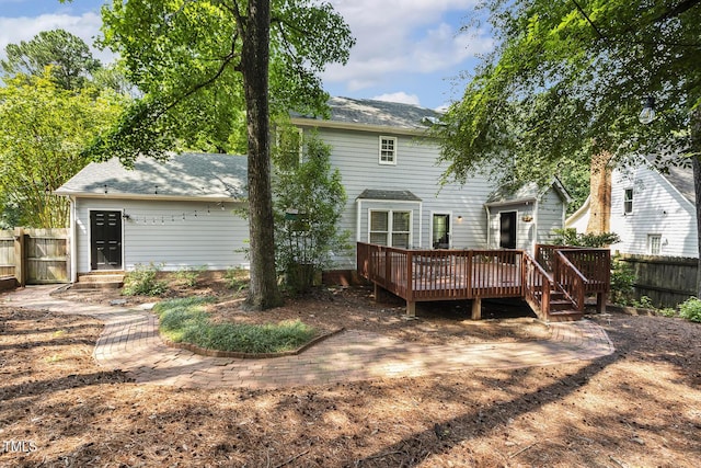 105 Cavendish Dr, Cary, NC 27513 - rear view of property featuring a deck and roof with shingles