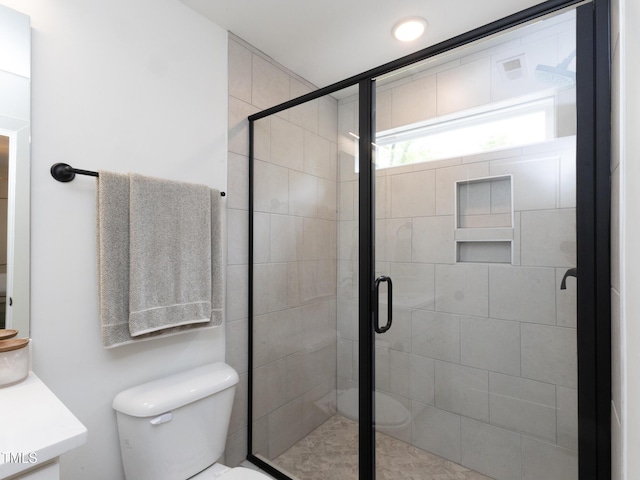 612 E Ellerbee St, Durham, NC 27704 - full bathroom featuring toilet, a shower stall, and vanity