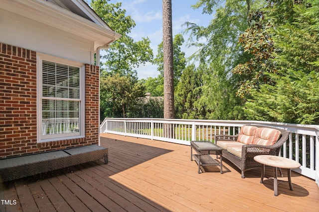 deck with an outdoor hangout area