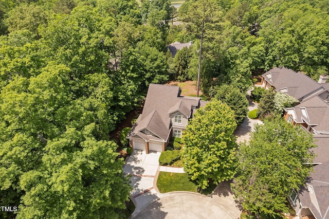 aerial view with a wooded view