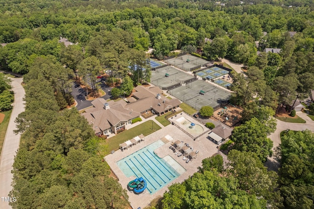 aerial view with a wooded view