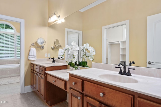 full bathroom with a garden tub, tile patterned flooring, and vanity