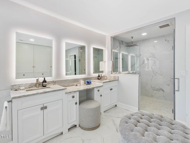 bathroom with visible vents, vanity, marble finish floor, a marble finish shower, and recessed lighting