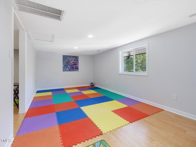 interior space with recessed lighting, baseboards, and visible vents