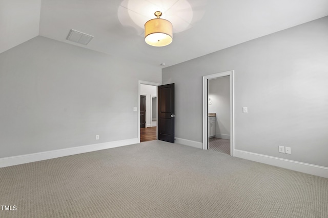 523 Vick Ave, Raleigh, NC 27612 - unfurnished bedroom with carpet floors and baseboards