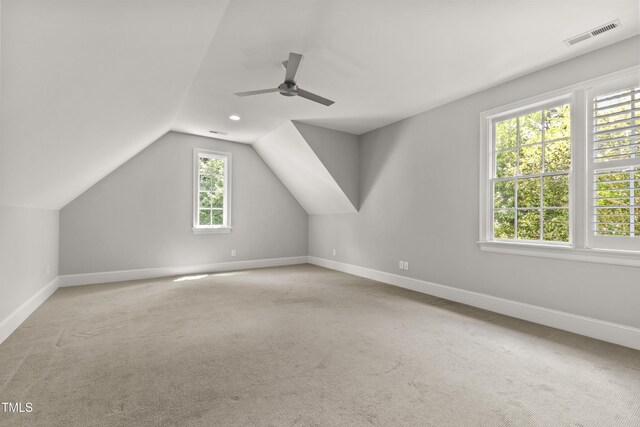 523 Vick Ave, Raleigh, NC 27612 - bonus room featuring baseboards, carpet, vaulted ceiling, and ceiling fan