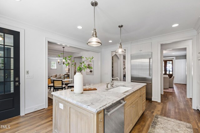 523 Vick Ave, Raleigh, NC 27612 - kitchen featuring stainless steel appliances, a sink, healthy amount of natural light, crown molding, and dark wood-style flooring