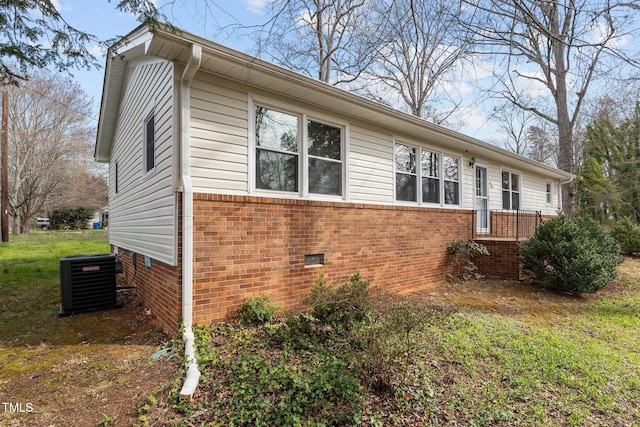 505 E Graham St, Mebane, NC 27302 - view of home's exterior with a yard, brick siding, crawl space, and cooling unit
