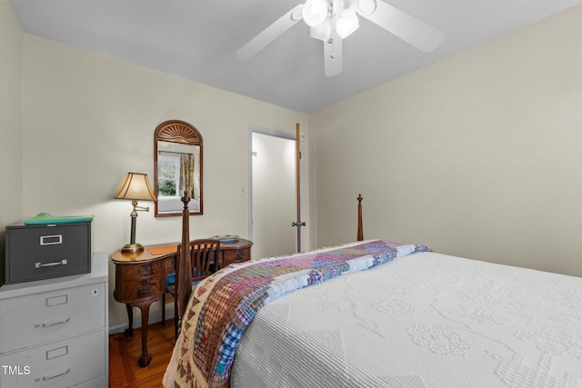 505 E Graham St, Mebane, NC 27302 - bedroom with wood finished floors, baseboards, and a ceiling fan