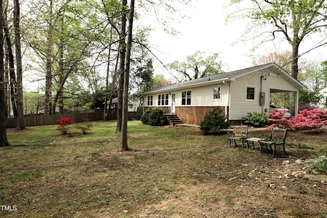505 E Graham St, Mebane, NC 27302 - back of property with a yard and fence