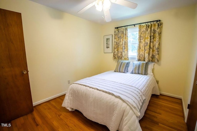 505 E Graham St, Mebane, NC 27302 - bedroom featuring wood finished floors and ceiling fan