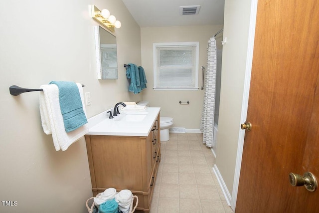505 E Graham St, Mebane, NC 27302 - bathroom with vanity, tile patterned flooring, and shower / bath combination with curtain