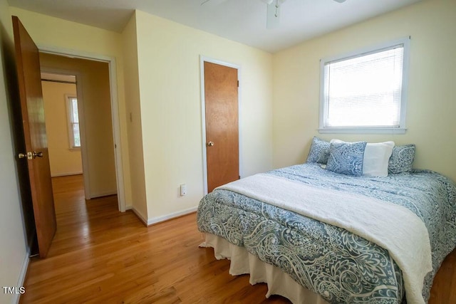 505 E Graham St, Mebane, NC 27302 - bedroom featuring light wood-style floors and multiple windows