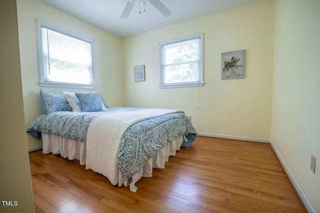 505 E Graham St, Mebane, NC 27302 - bedroom featuring wood finished floors and a ceiling fan