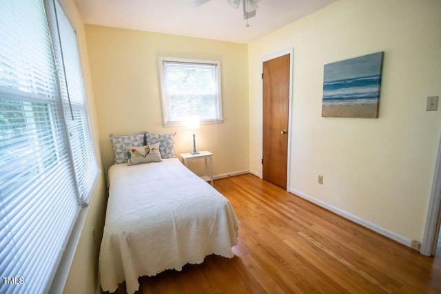 505 E Graham St, Mebane, NC 27302 - bedroom featuring light wood-style floors and a ceiling fan