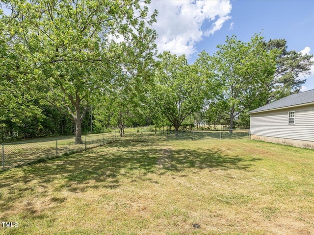 view of yard with fence