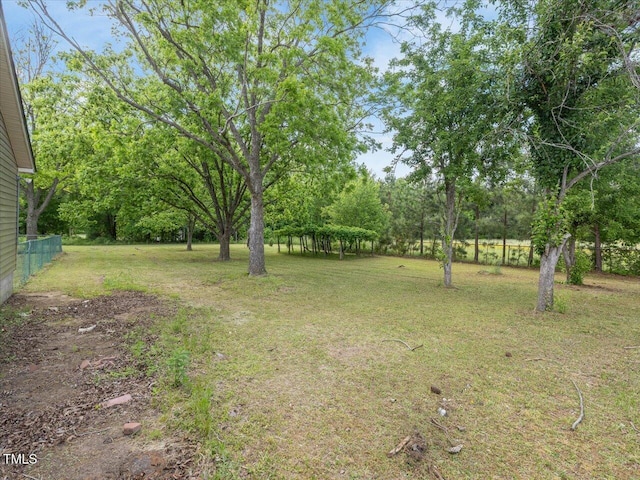 view of yard with fence