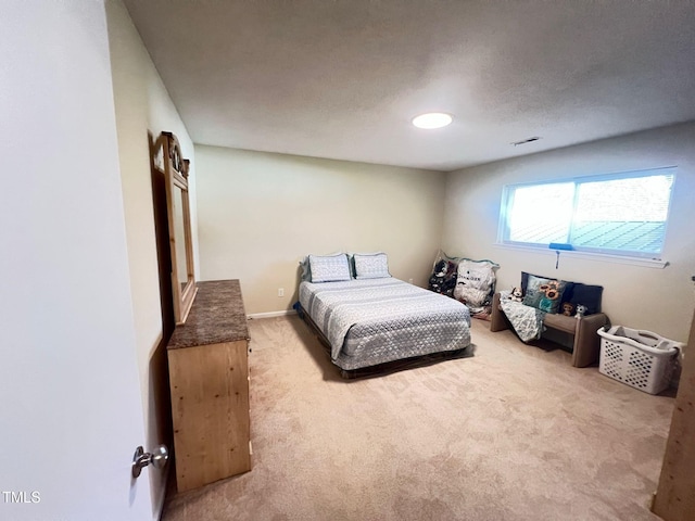 carpeted bedroom with visible vents