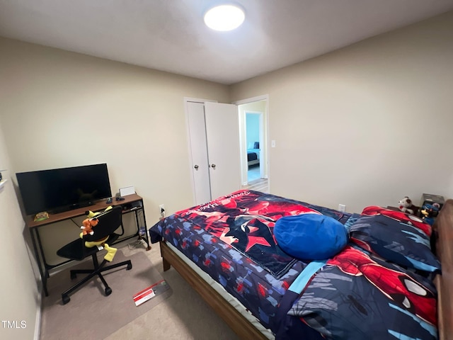 bedroom featuring carpet