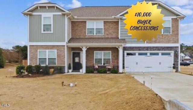 100 Hadley Dr, La Grange, NC 28551 - view of front of house with a garage, driveway, and stone siding